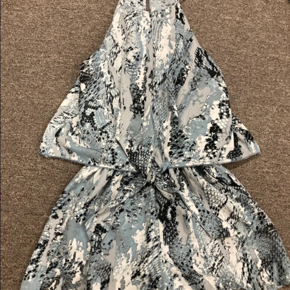 Boutique brand “ Tyche” snake print romper